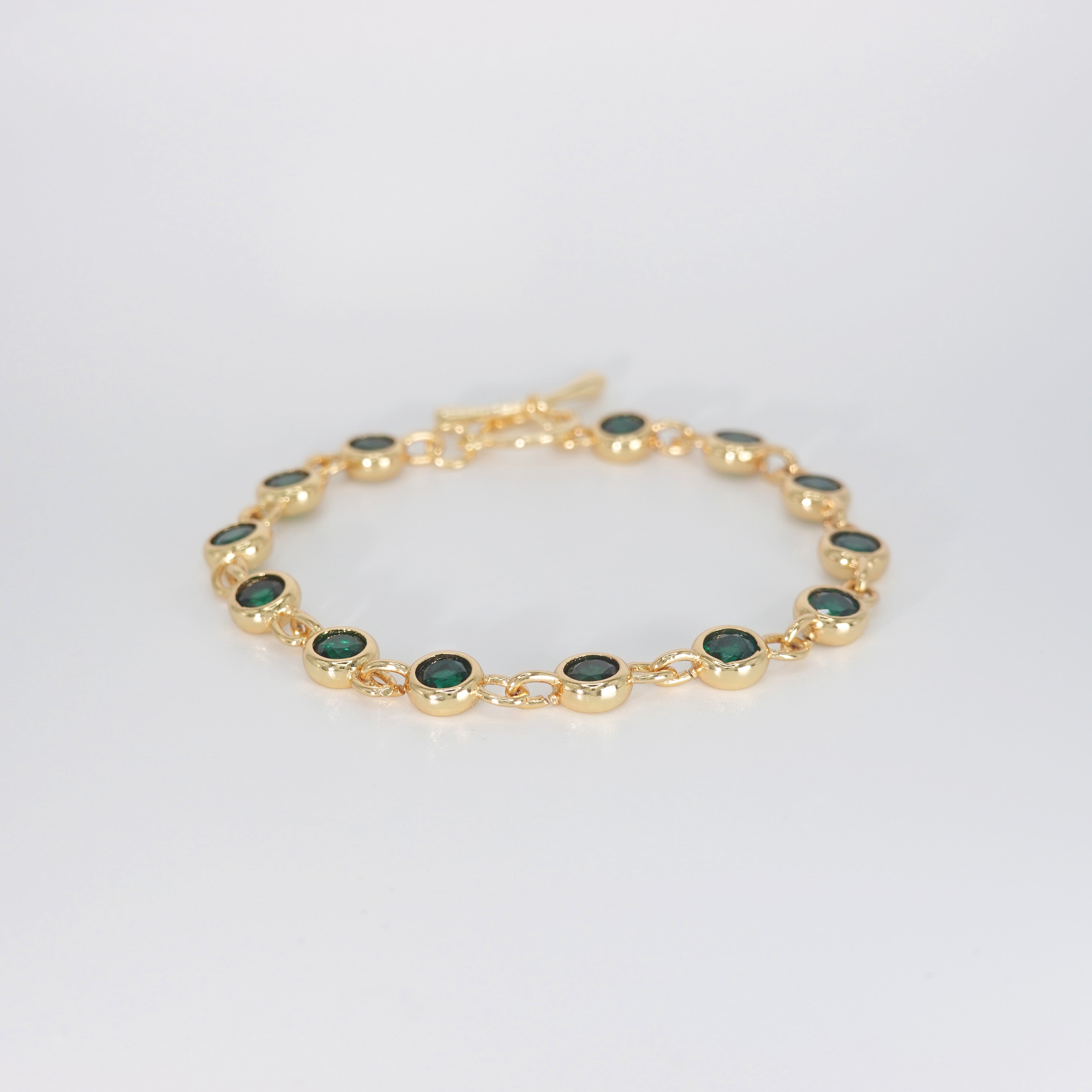 Begonia Bracelet: Adorned with lush green stones, epitome of natural beauty and freshness.