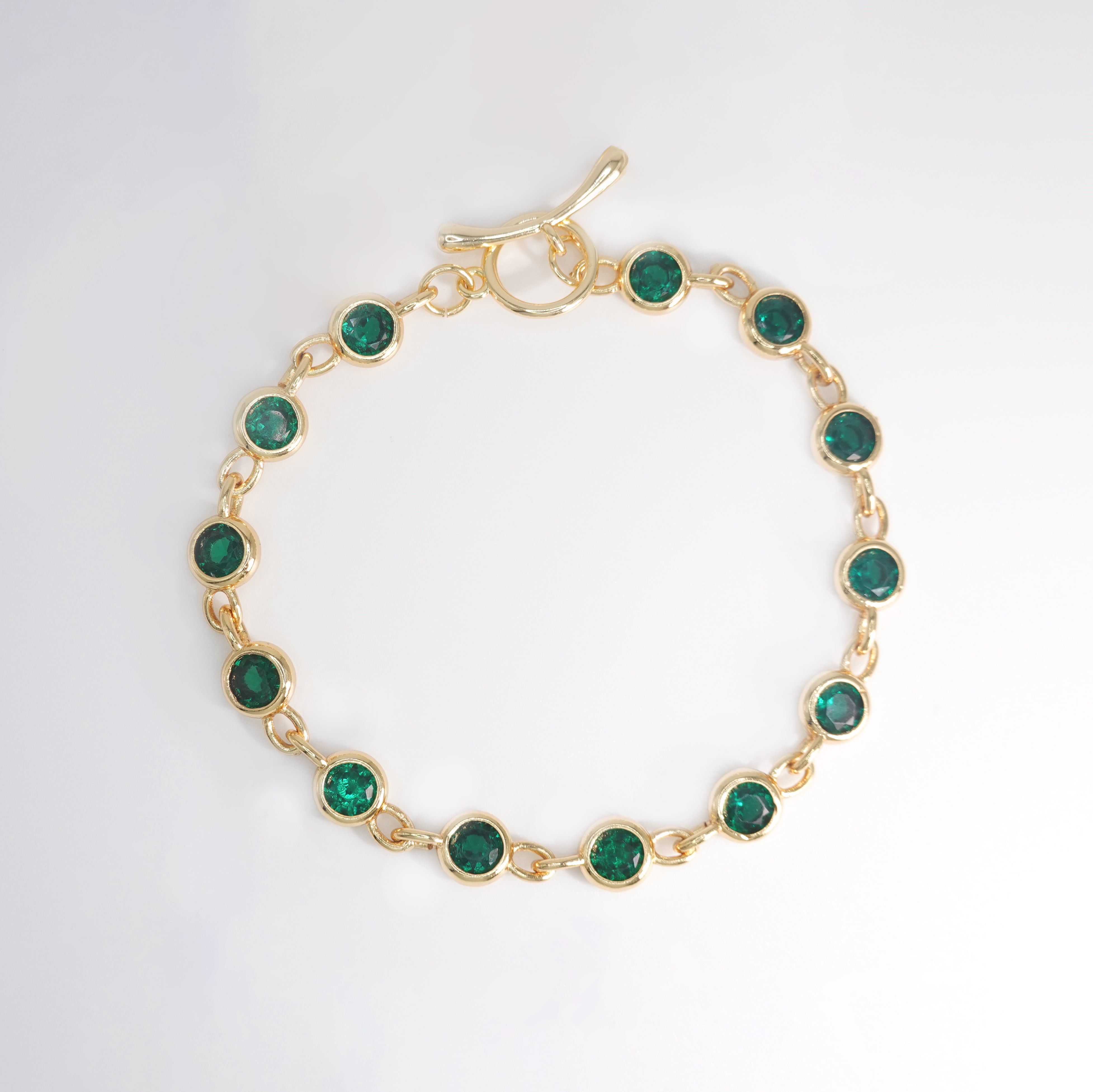 Begonia Bracelet: Adorned with lush green stones, epitome of natural beauty and freshness.