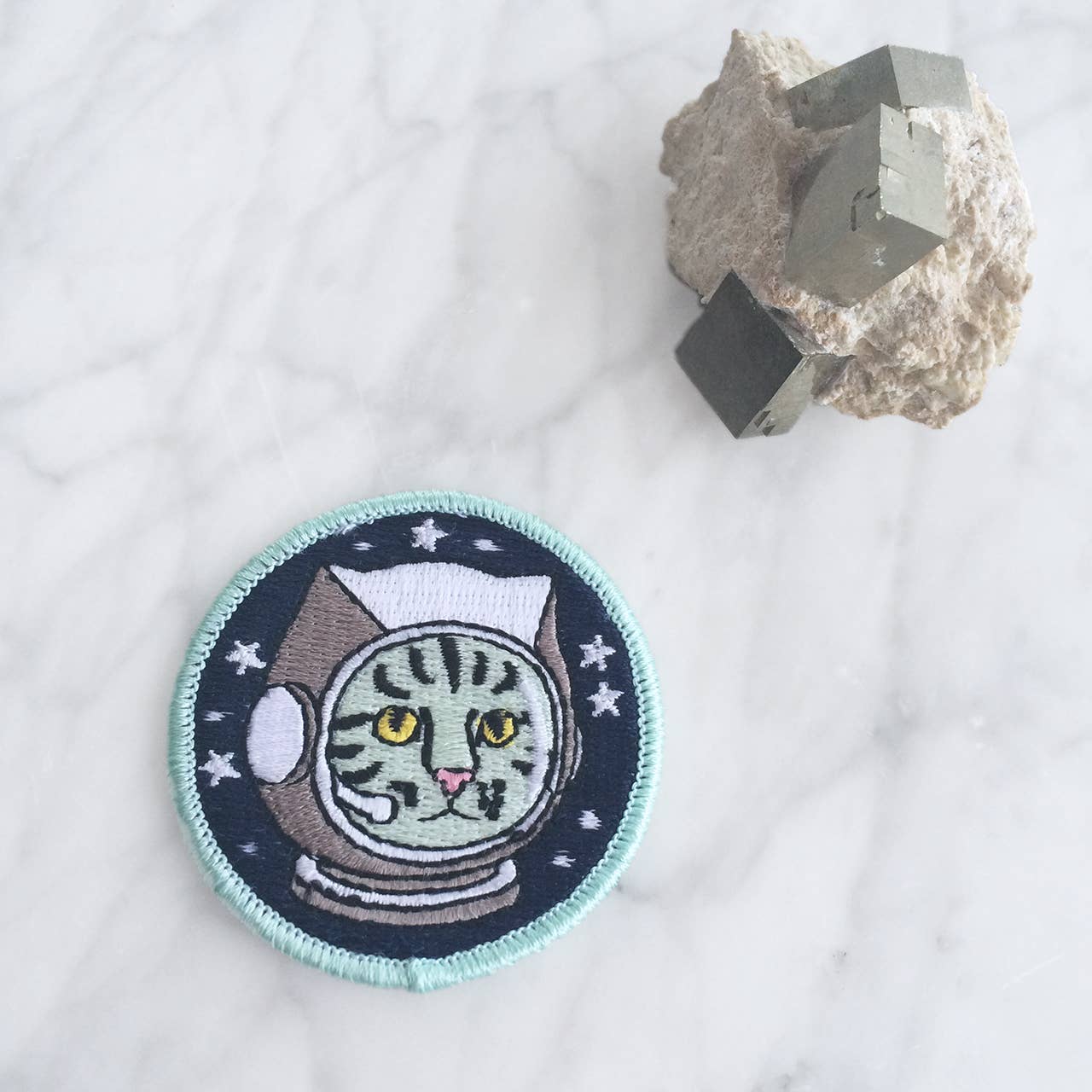 Astro Kitty Patch - Adorable patch featuring a space-traveling kitty for a playful and cosmic touch.