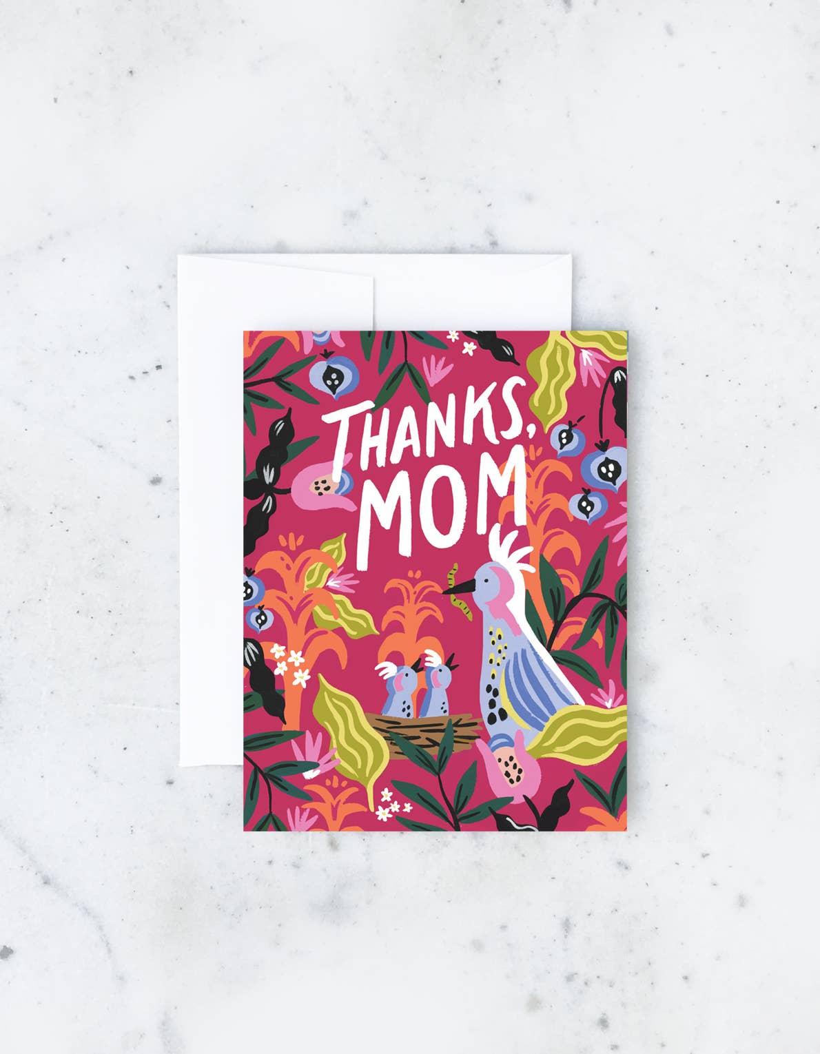 A colorful “Thanks Mom” card featuring vibrant floral and bird illustrations on a bright background.