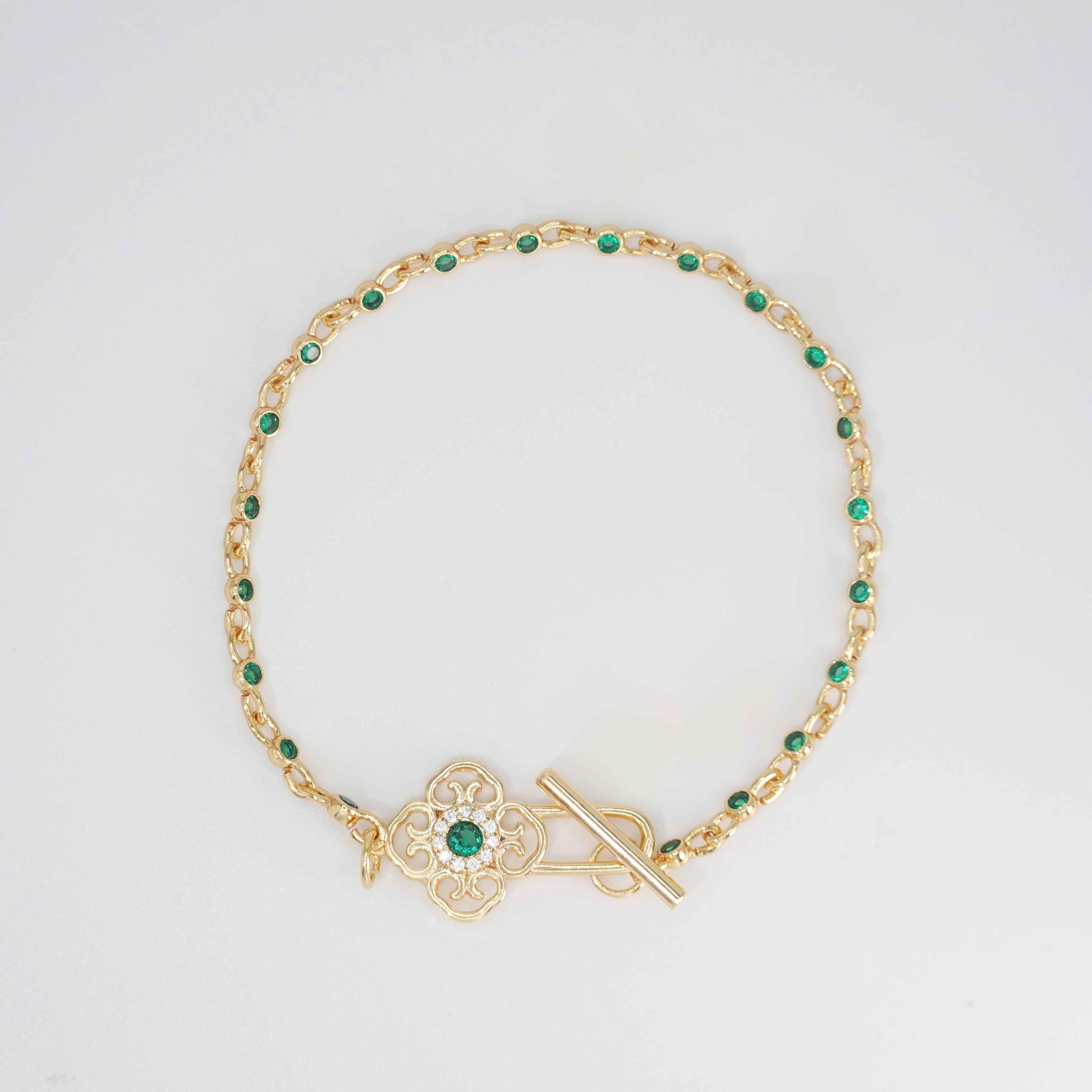 Lotus Bracelet: Shimmering stones encircling a serene green centerpiece, epitome of elegance and tranquility.
