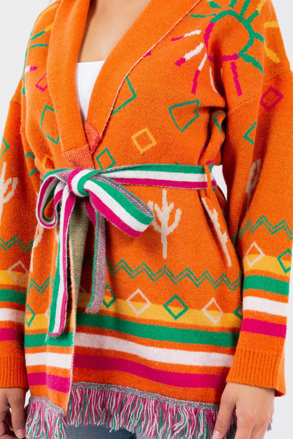 Maya Cardigan - A sophisticated knit with a flattering silhouette and delicate details for timeless elegance.