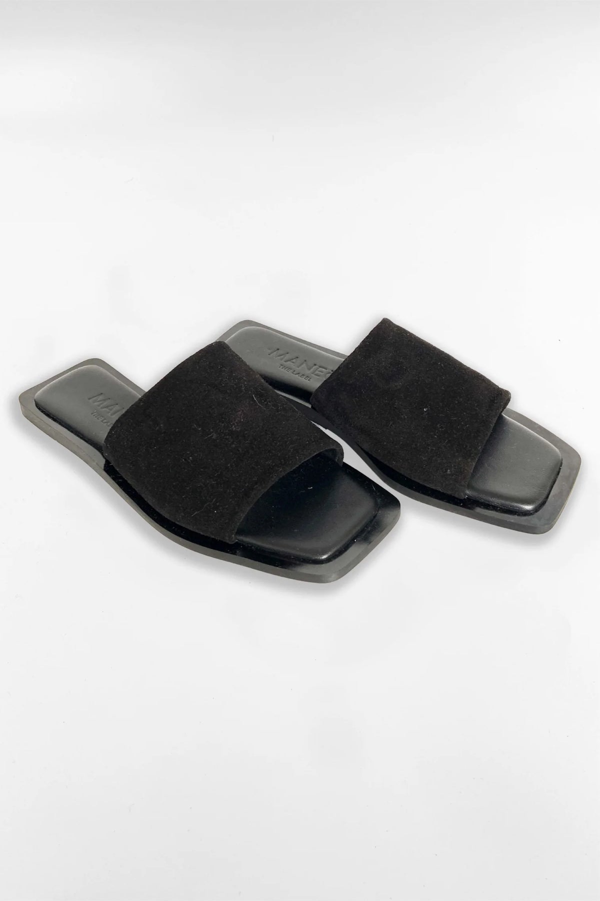 Lenny Sandals displayed in both suede and leather options, showcasing their luxurious materials and classic design.