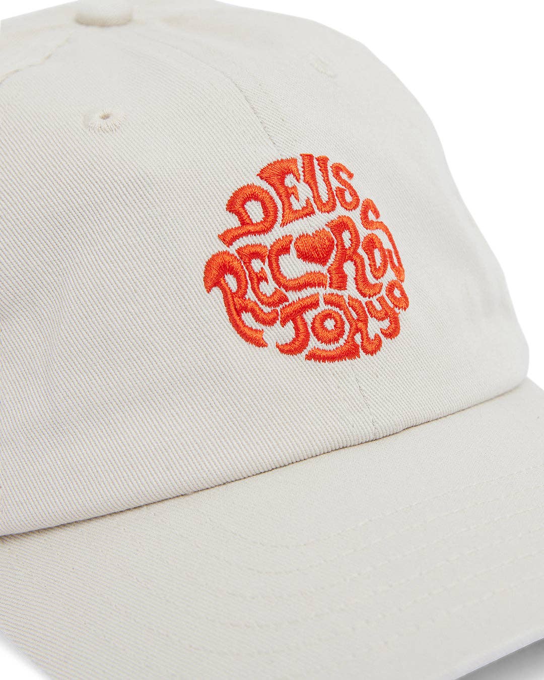 Beige cap with red embroidered logo on a white background