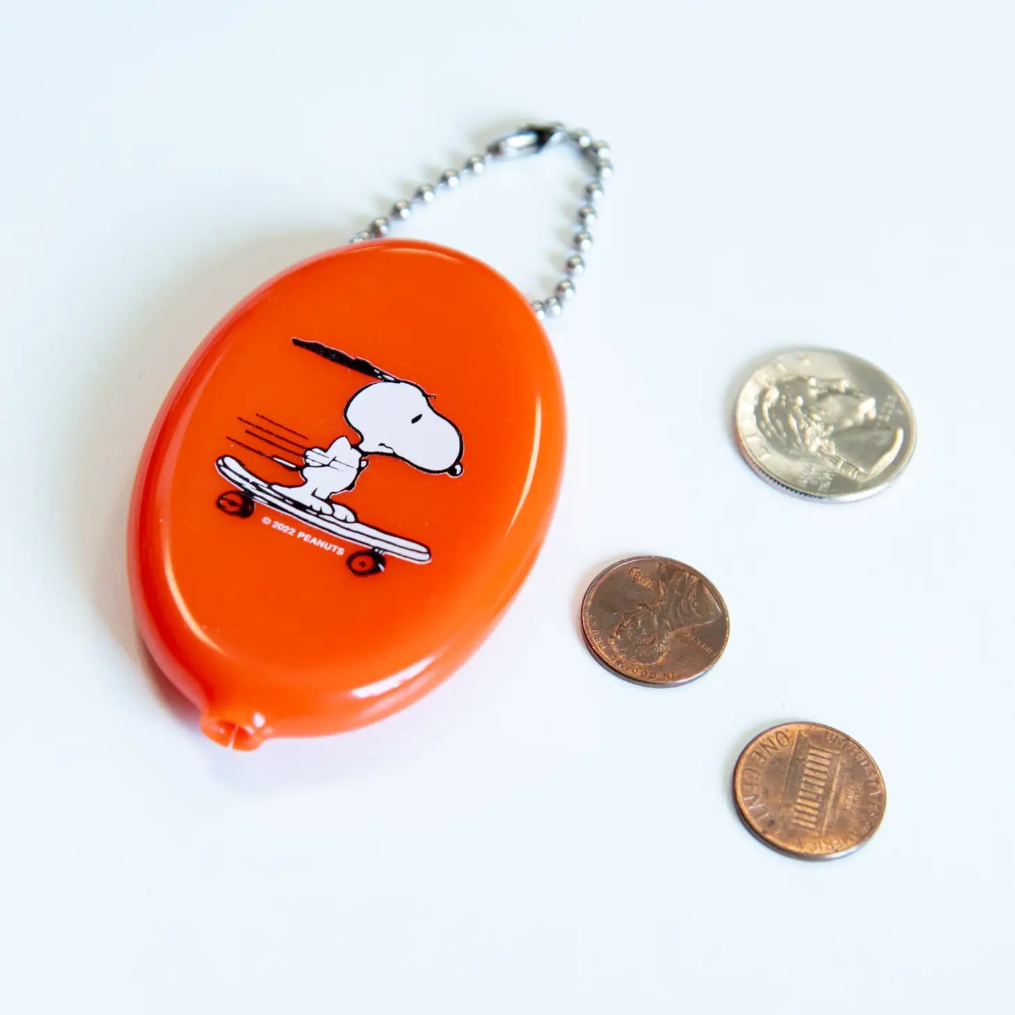 Peanuts Snoopy Skateboard Coin Pouch - Snoopy on a skateboard, a playful and compact coin pouch for Peanuts enthusiasts.