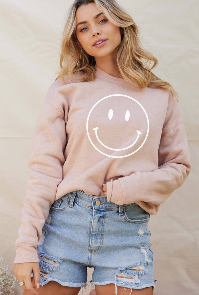 Smiley Face Sweater: Yellow sweater with a large smiley face design.