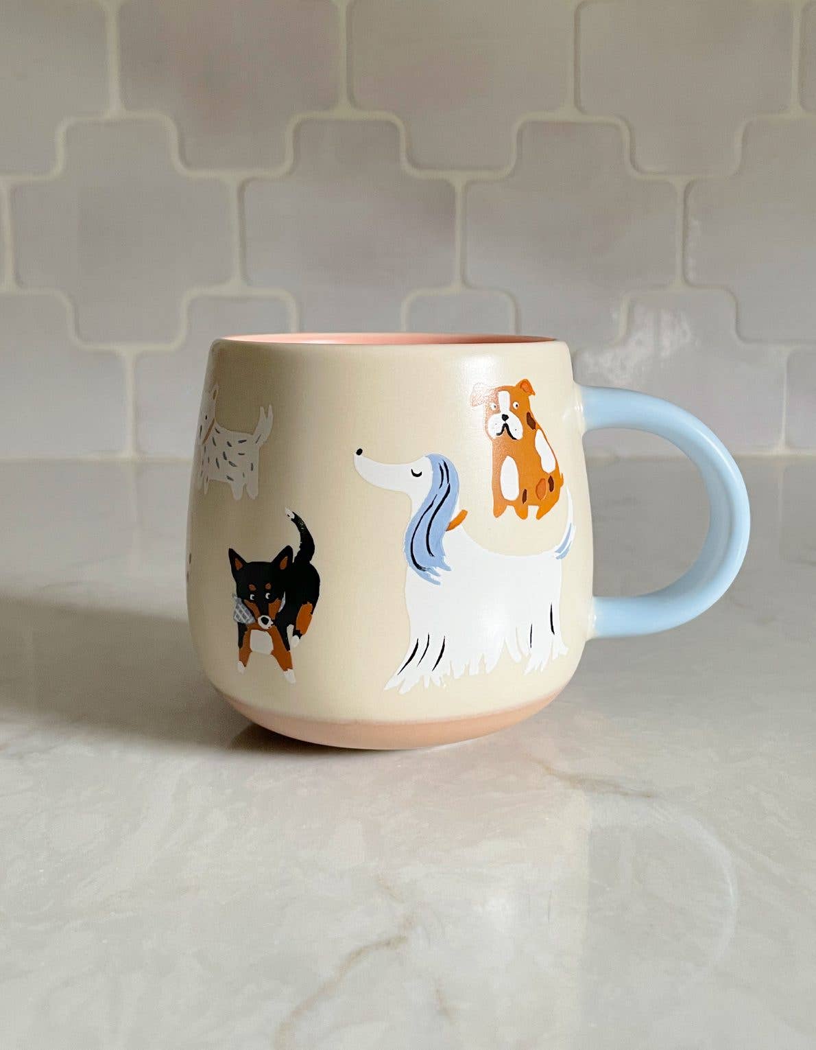 FORMA Ceramic Dogs Mug - Quirky canine charm for delightful sips.