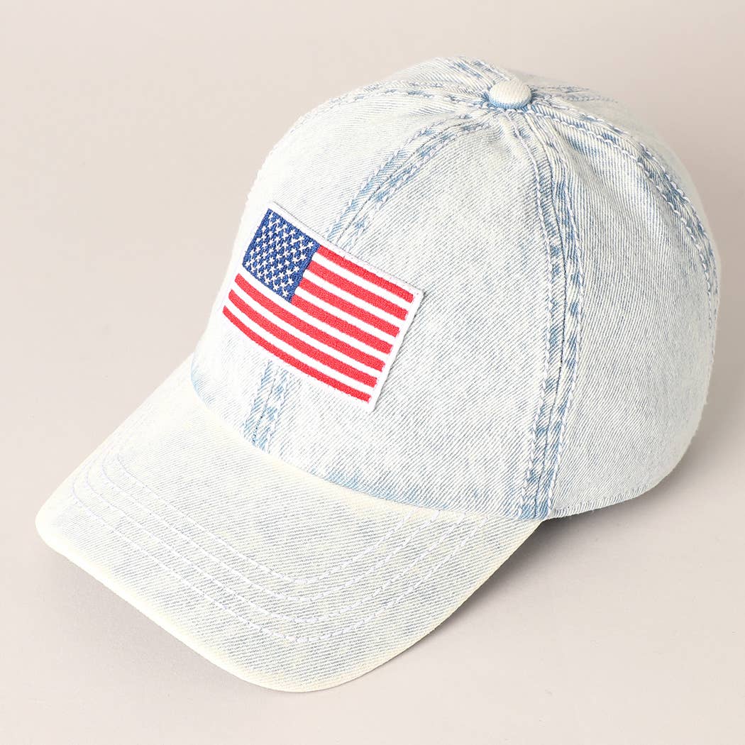 Light-wash denim baseball cap with embroidered American flag patch, ideal for 4th of July.