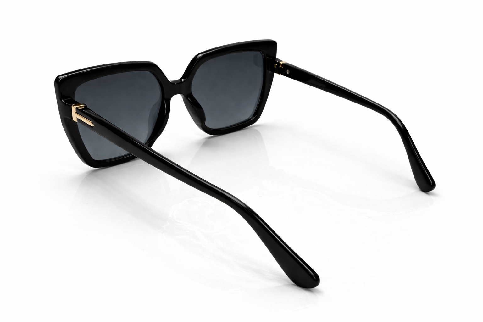 Black cat-eye sunglasses on a white background