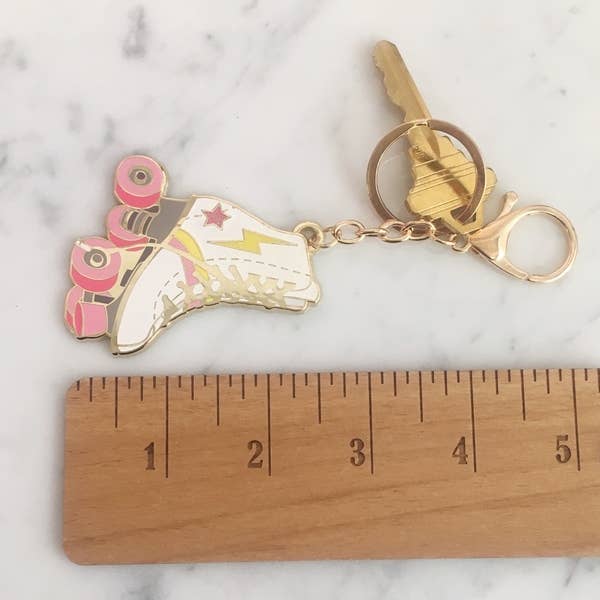 Roller Skate Keychain with a fun roller skate design and star accent.