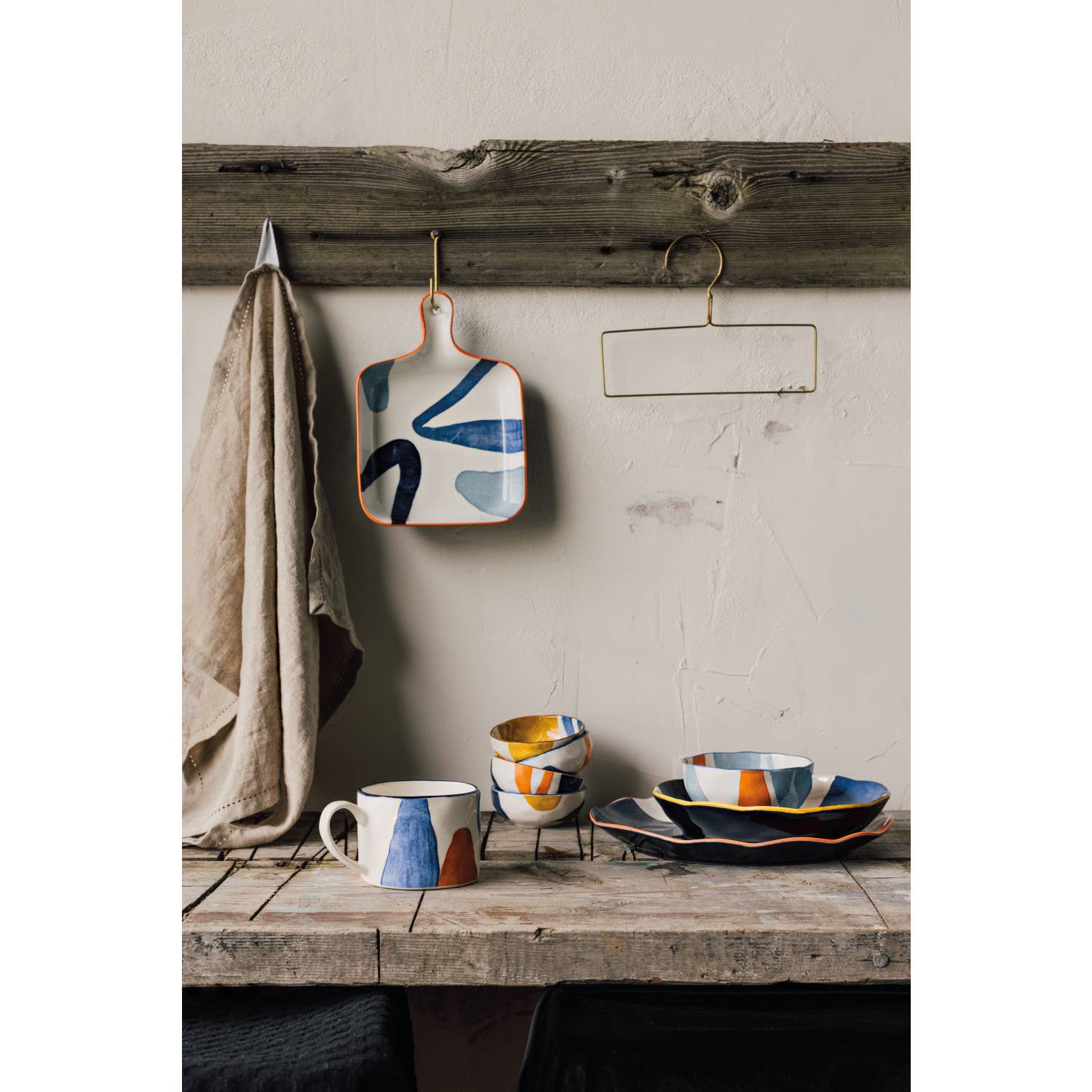 Canvas Mug with abstract mustard yellow, navy blue, and light blue patterns.