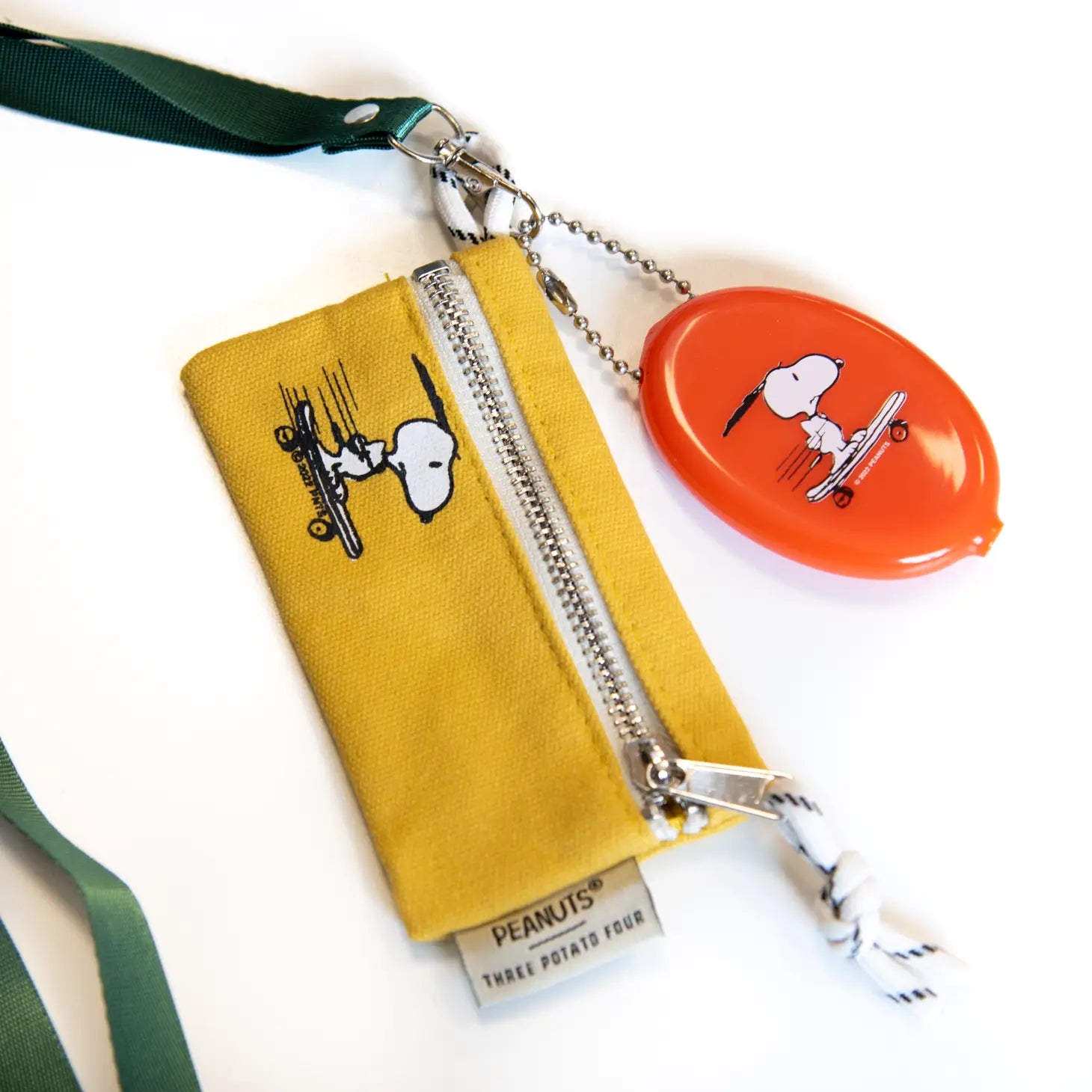 Peanuts Snoopy Skateboard Coin Pouch - Snoopy on a skateboard, a playful and compact coin pouch for Peanuts enthusiasts.