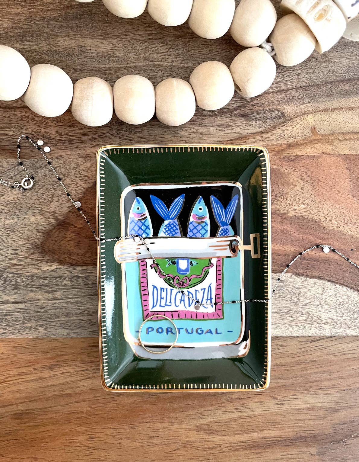 Sardines Trinket Dish: Hand-painted ceramic dish with sardine design, epitome of coastal charm.