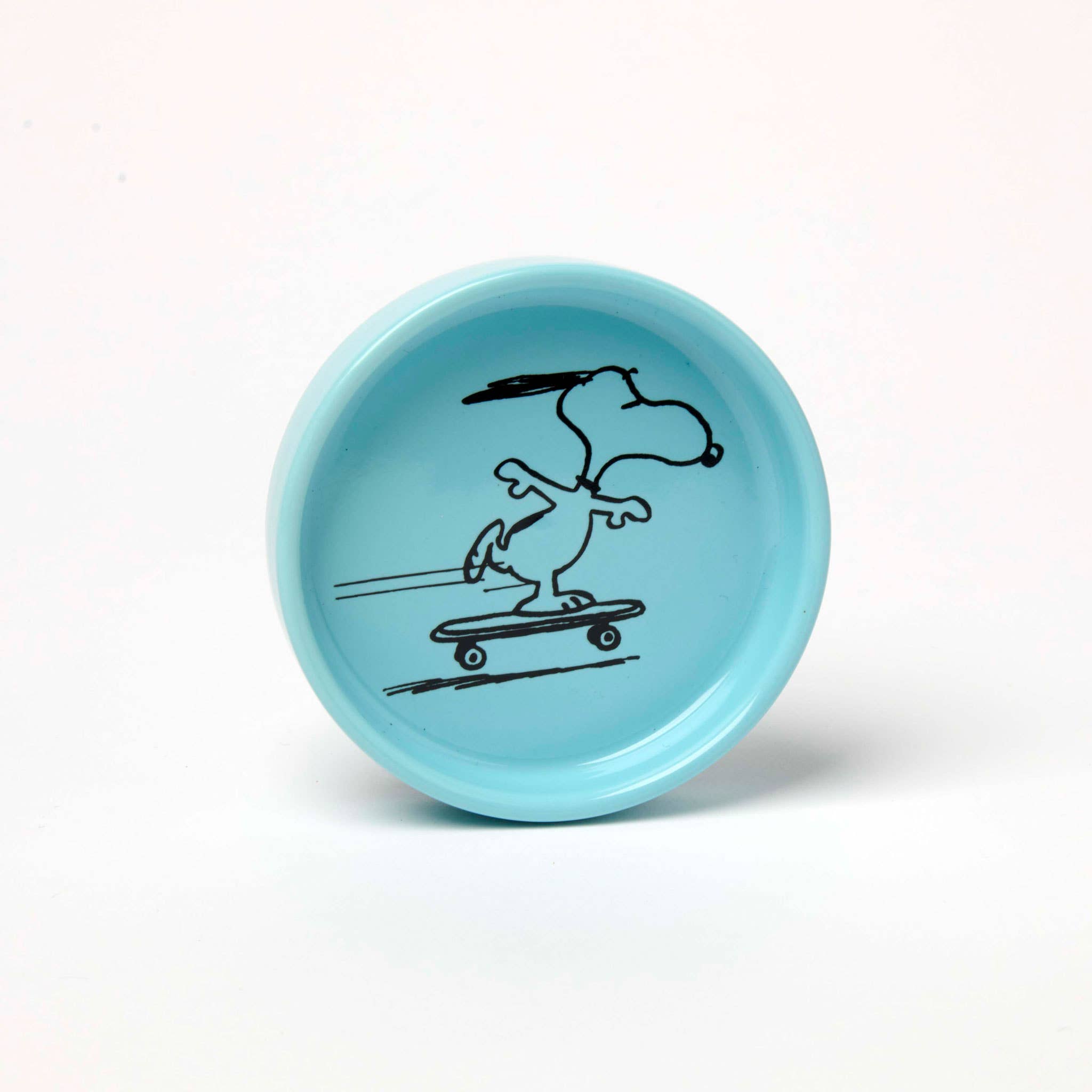 Blue Snoopy pin dish with a skateboarding Snoopy illustration.