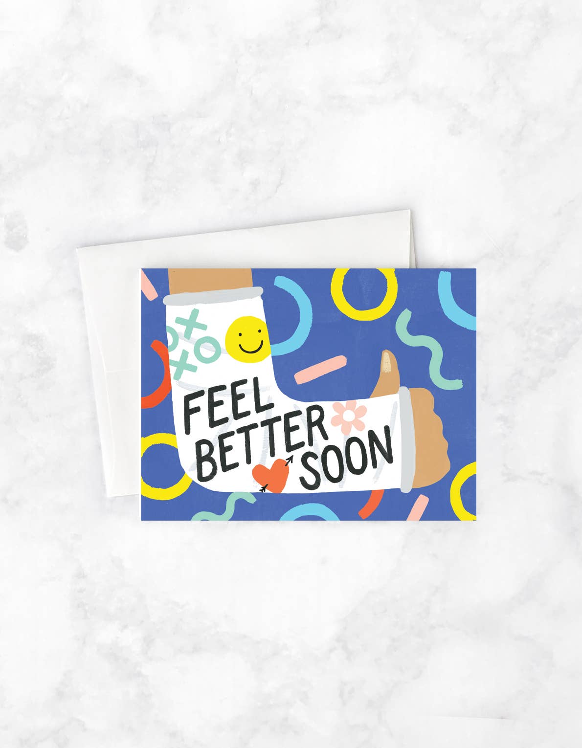 Get well card with an illustrated arm in a cast giving a thumbs up, decorated with doodles and the words “Feel Better Soon”.