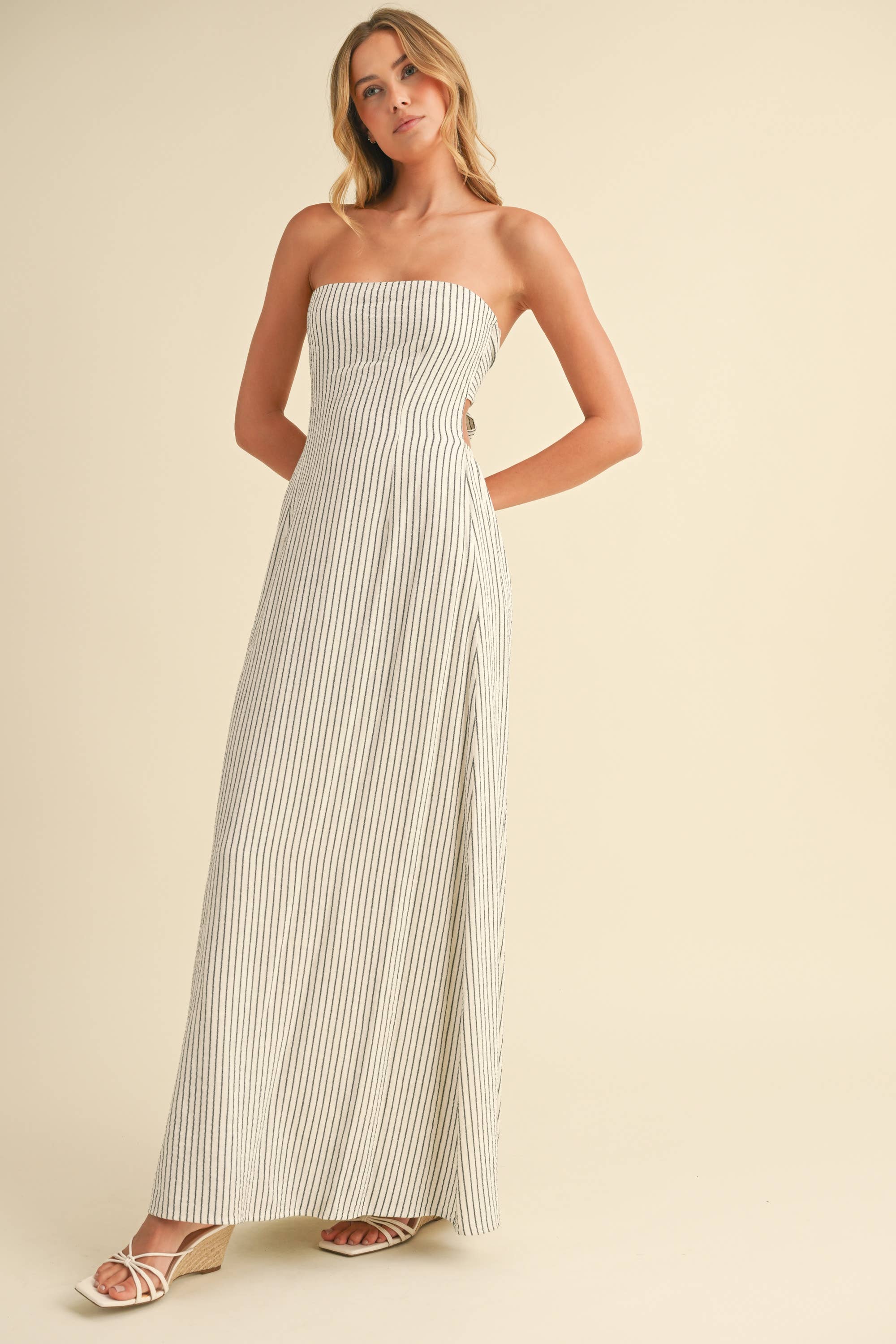 Back-tie strapless striped maxi dress with full-length skirt and bow detail