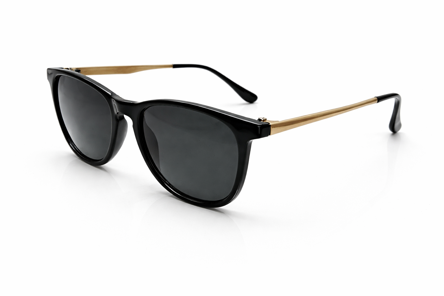 Black sunglasses with gold accents on a white background