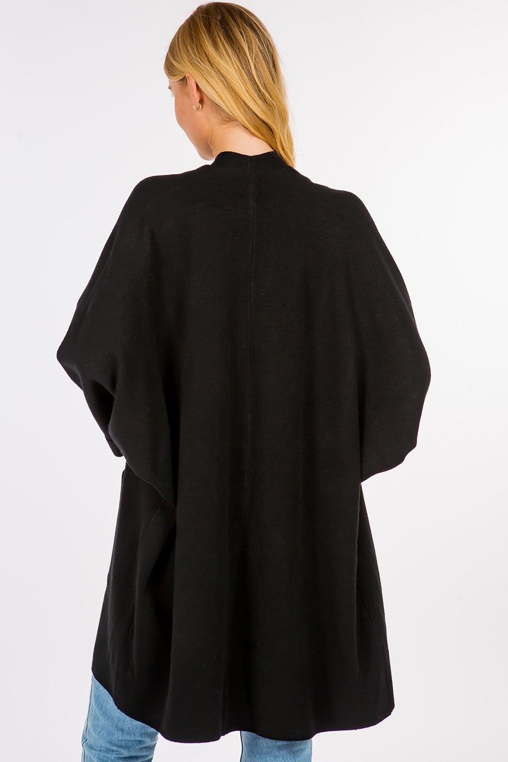 Olivia Cardigan showcasing its open-face design, lightweight knit fabric, and ribbed detailing, ideal for effortless and stylish layering.