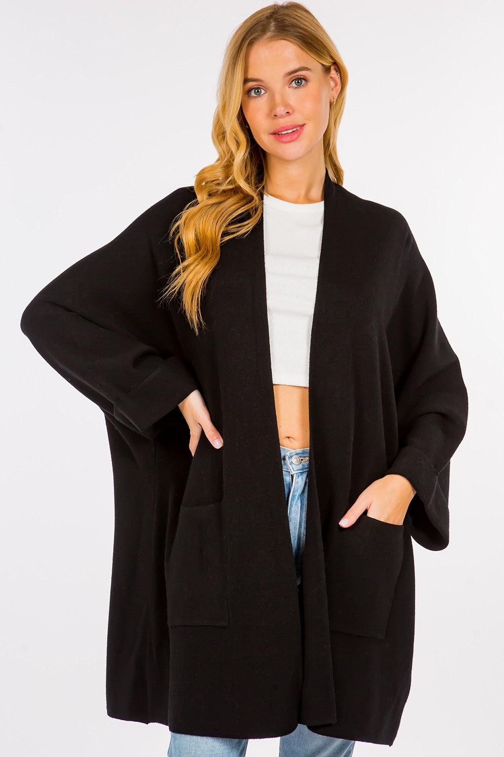 Olivia Cardigan showcasing its open-face design, lightweight knit fabric, and ribbed detailing, ideal for effortless and stylish layering.