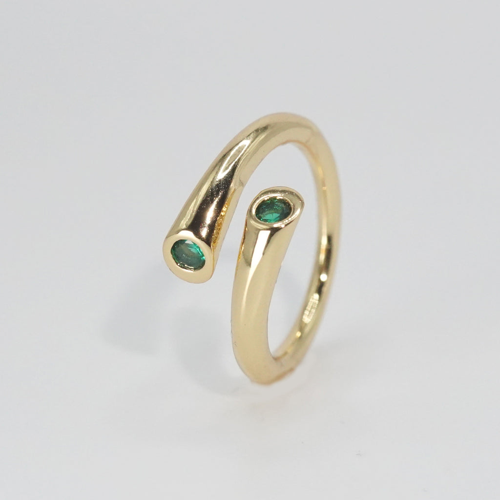 Thalia Ring: Twin mesmerizing green stones, epitome of elegance.