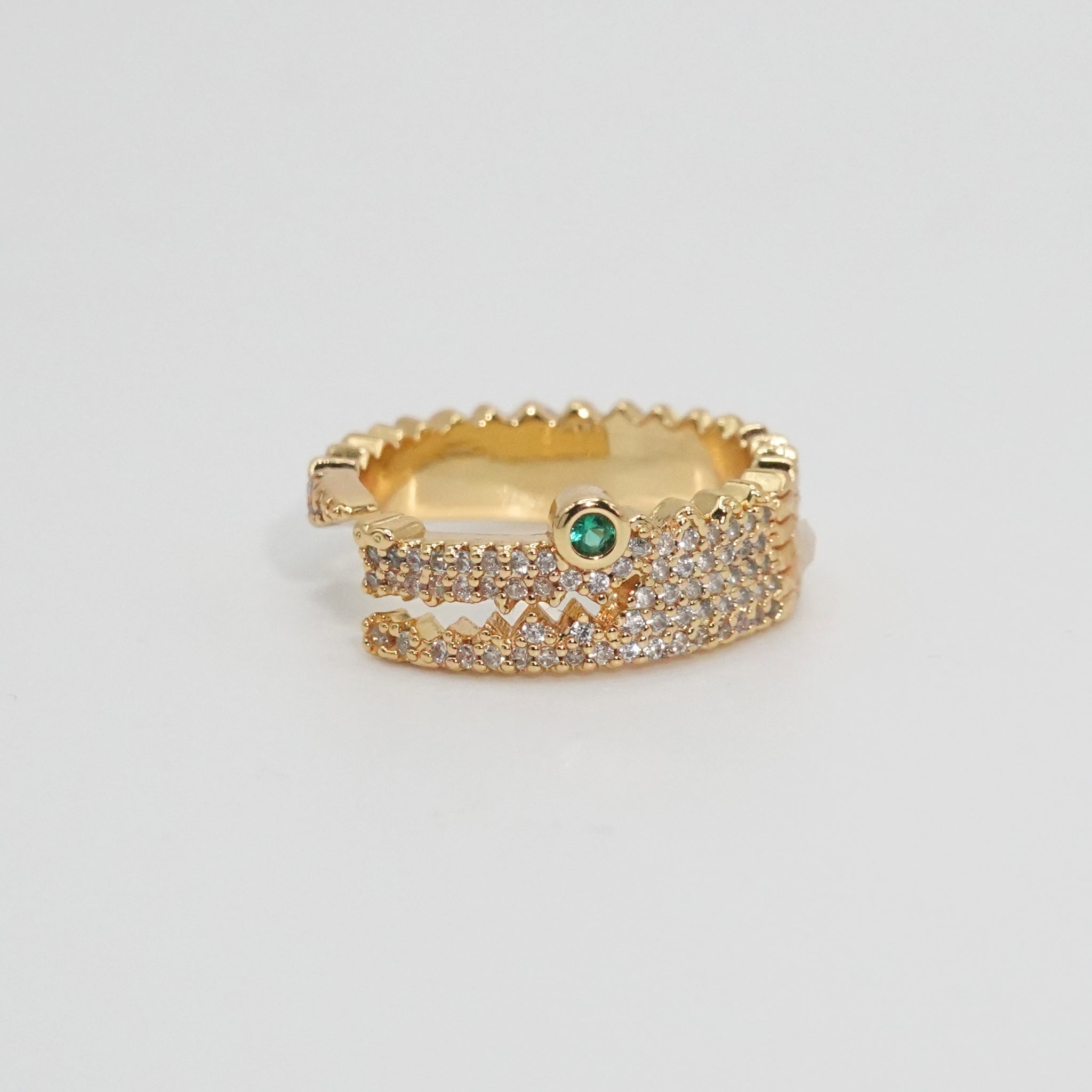 Brooks Ring: Crocodile head design with shiny stones and a captivating green eye stone, epitome of untamed sophistication.