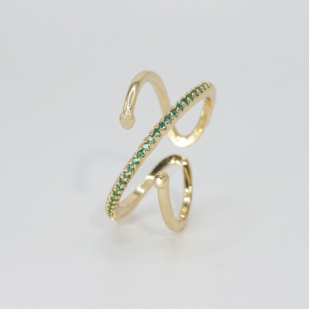  Prospect Ring: Mesmerizing green stones, adding a pop of color and sophistication.