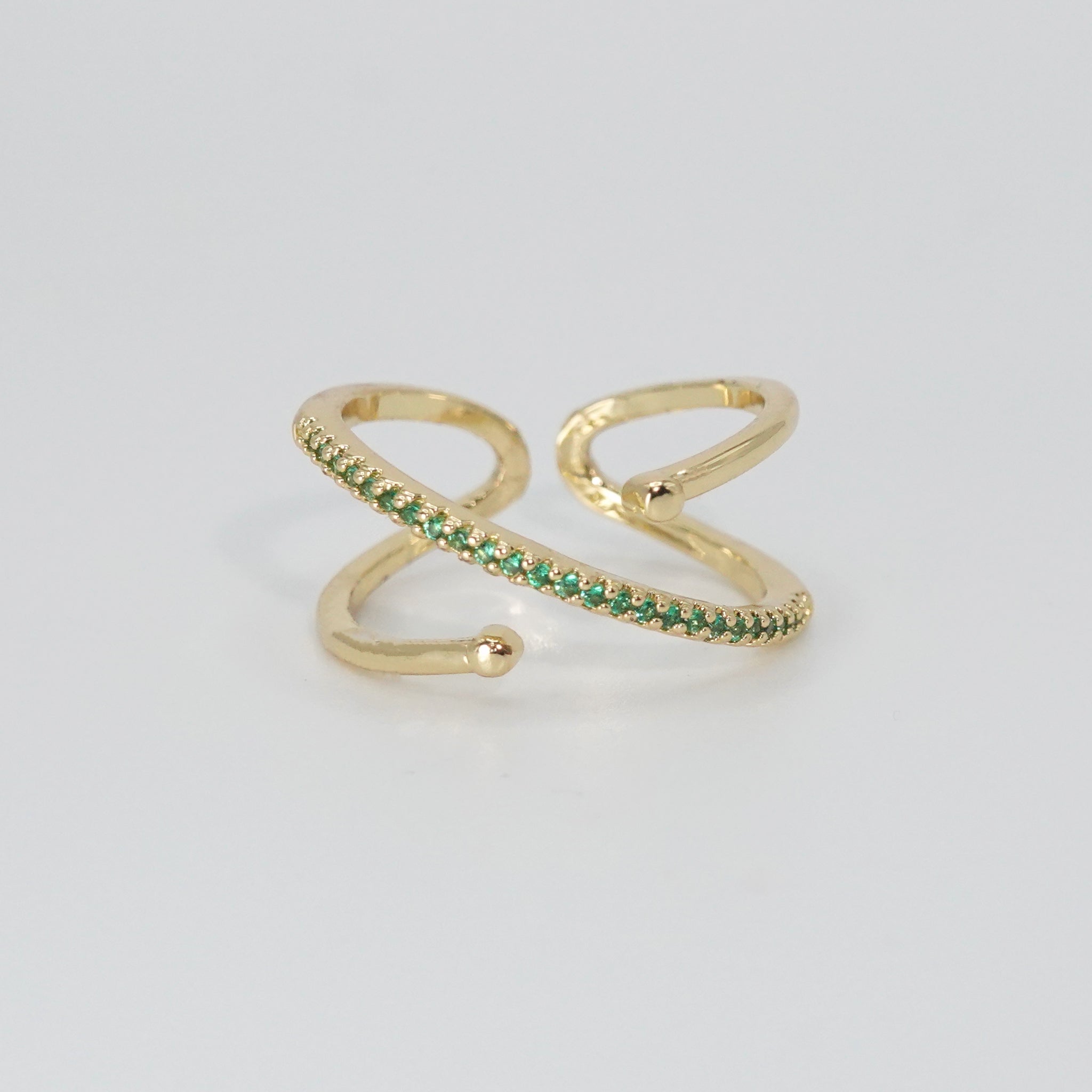 Prospect Ring: Mesmerizing green stones, adding a pop of color and sophistication.