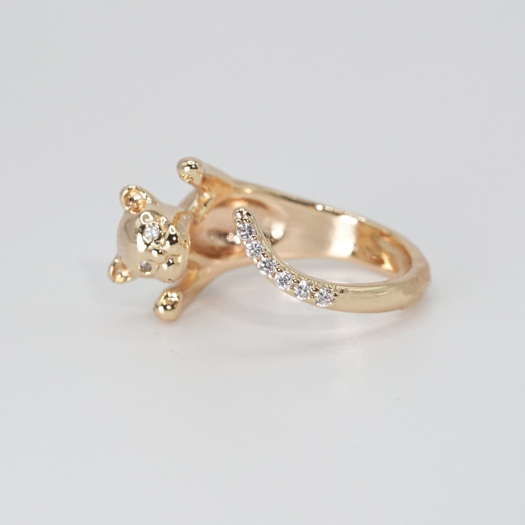Lindsey Ring: Charming cat figure adorned with sparkling stones, adding whimsy and elegance to your style.