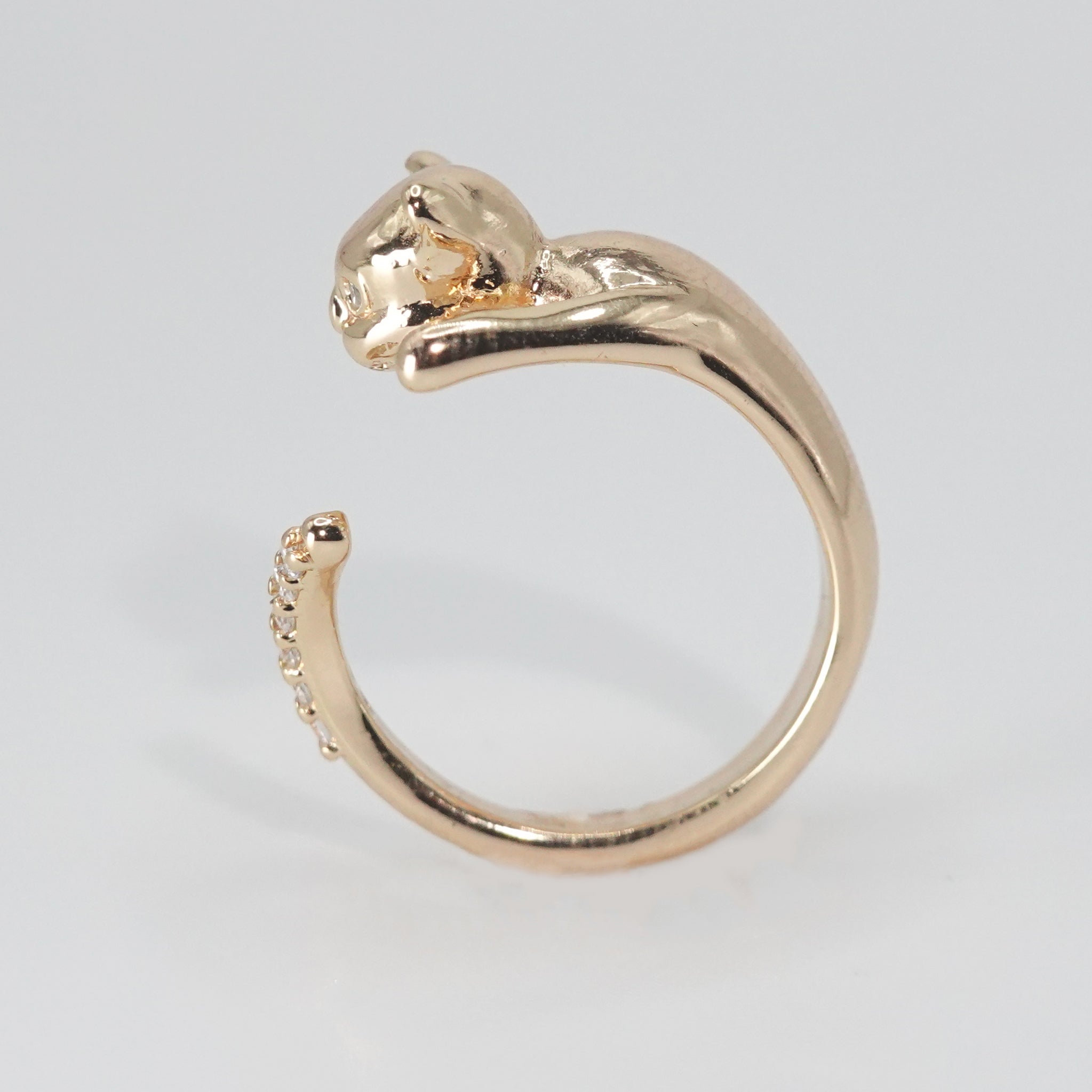 Lindsey Ring: Charming cat figure adorned with sparkling stones, adding whimsy and elegance to your style.