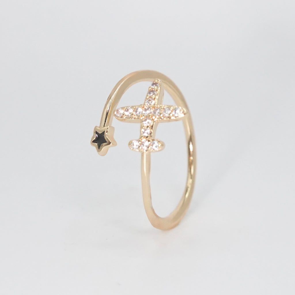 Cielo Ring - Sleek and modern, a celestial-inspired plane-shaped accessory.