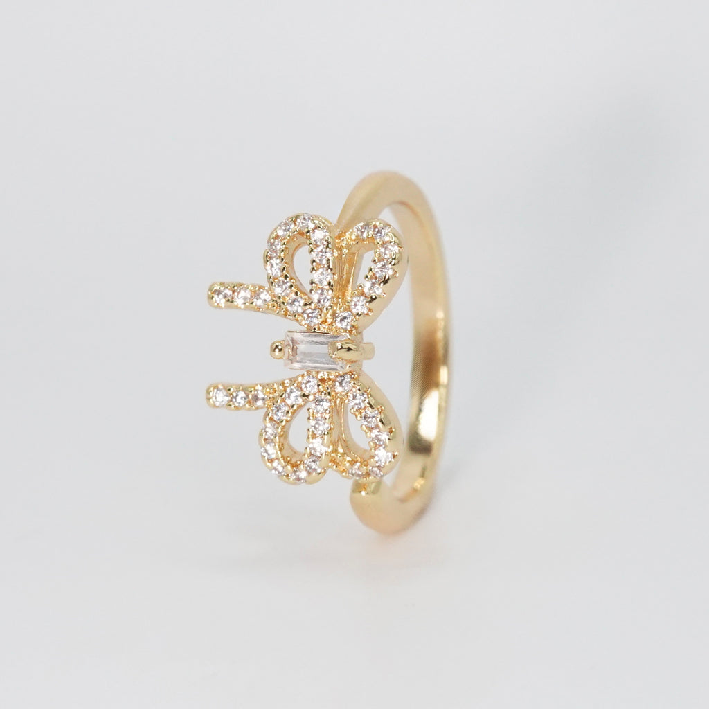 Las Flores Ring - Gift bow motif with sparkling stones.