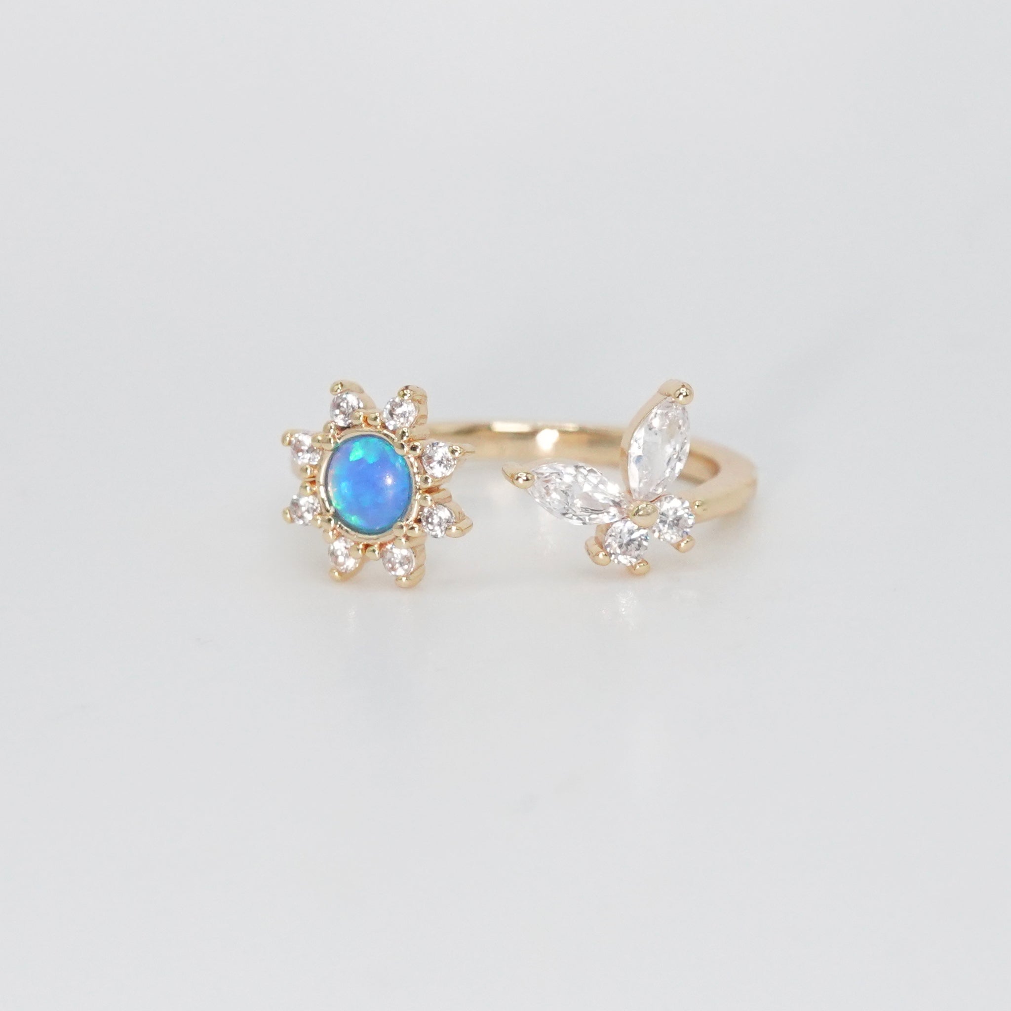 Sweetwater Ring - Opal centerpiece with butterfly and shimmering stones.