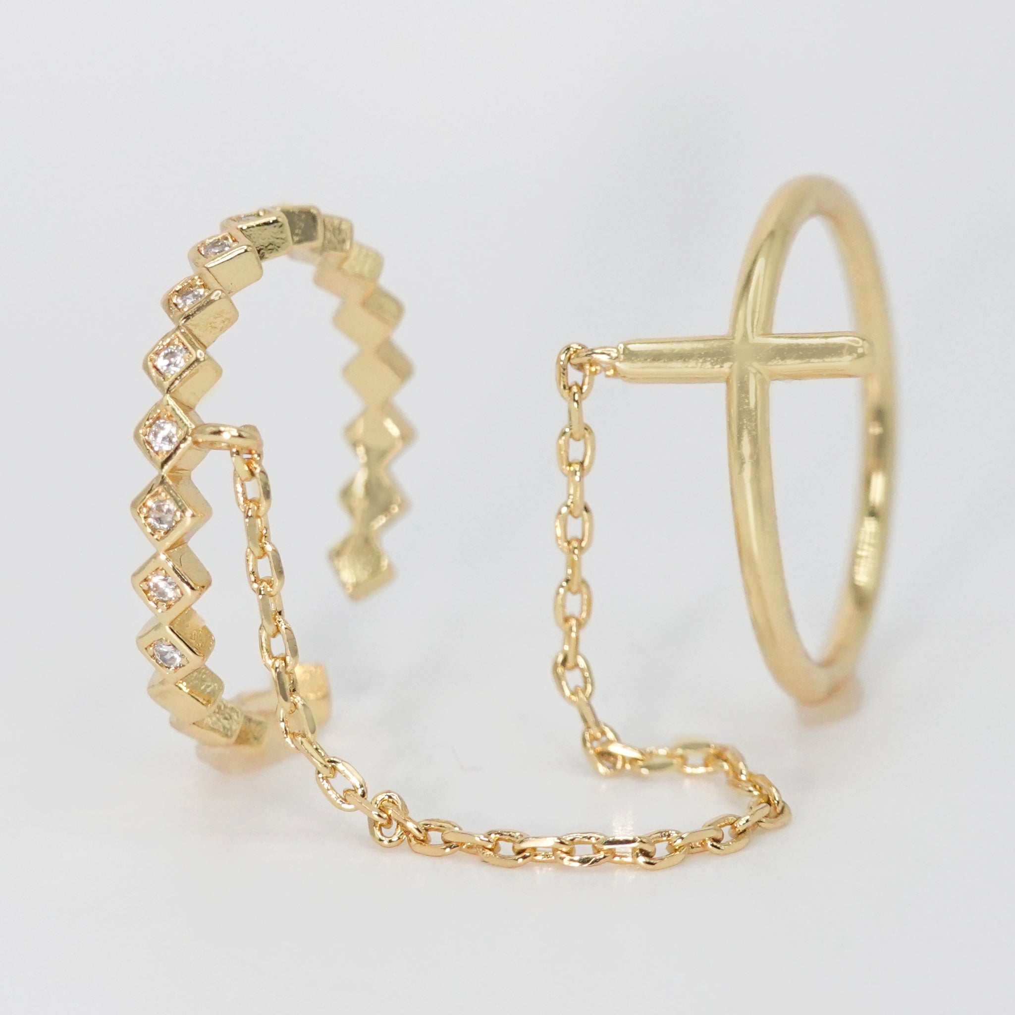 Andromeda Ring - Celestial-inspired accessory with interconnected rings and chain.