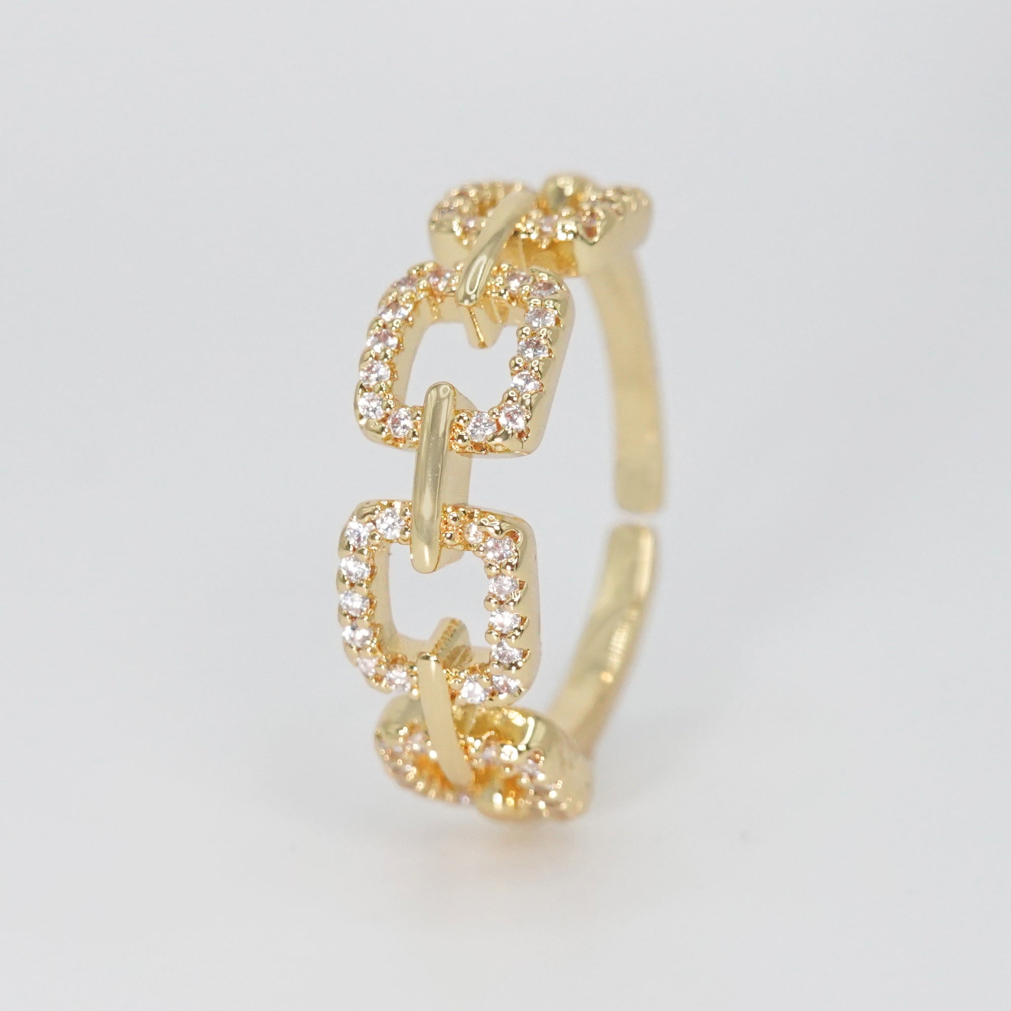Temescal Ring: Square chains with shimmering stones, exuding glamour.