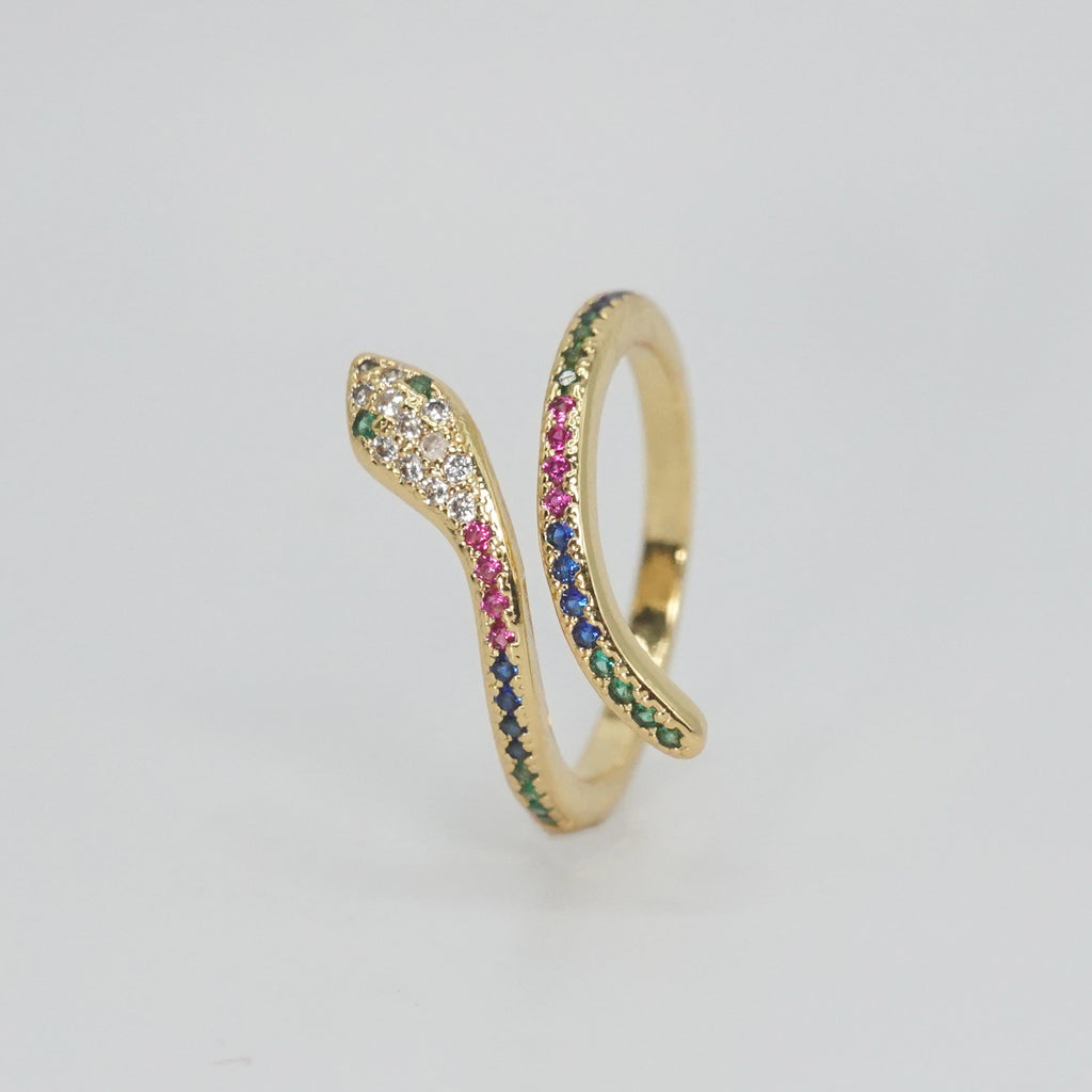 Shady Ring: Sinuous snake design adorned with colorful, shimmering stones, exuding mystery and charm.