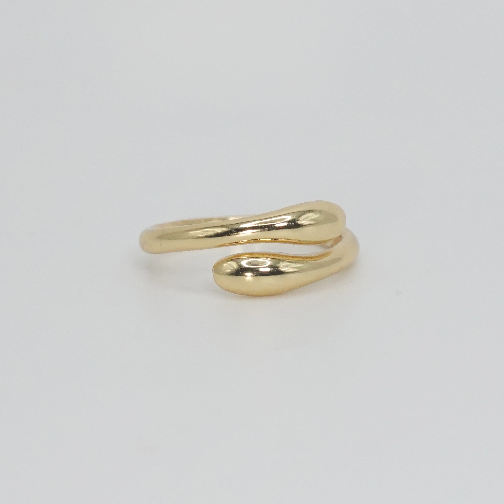 Zuniga Ring: Minimalist snake-inspired design, epitome of timeless charm.