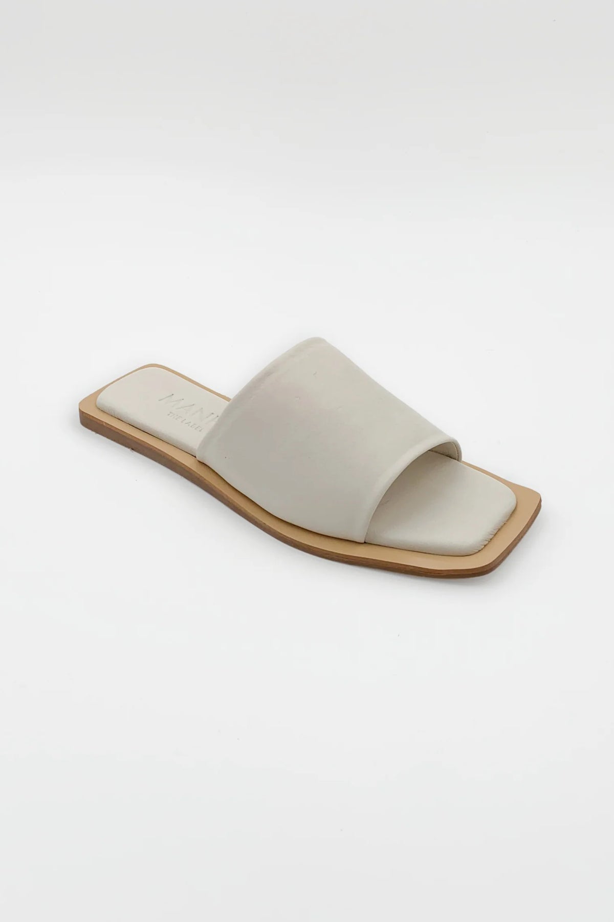 Lenny Sandals displayed in both suede and leather options, showcasing their luxurious materials and classic design.