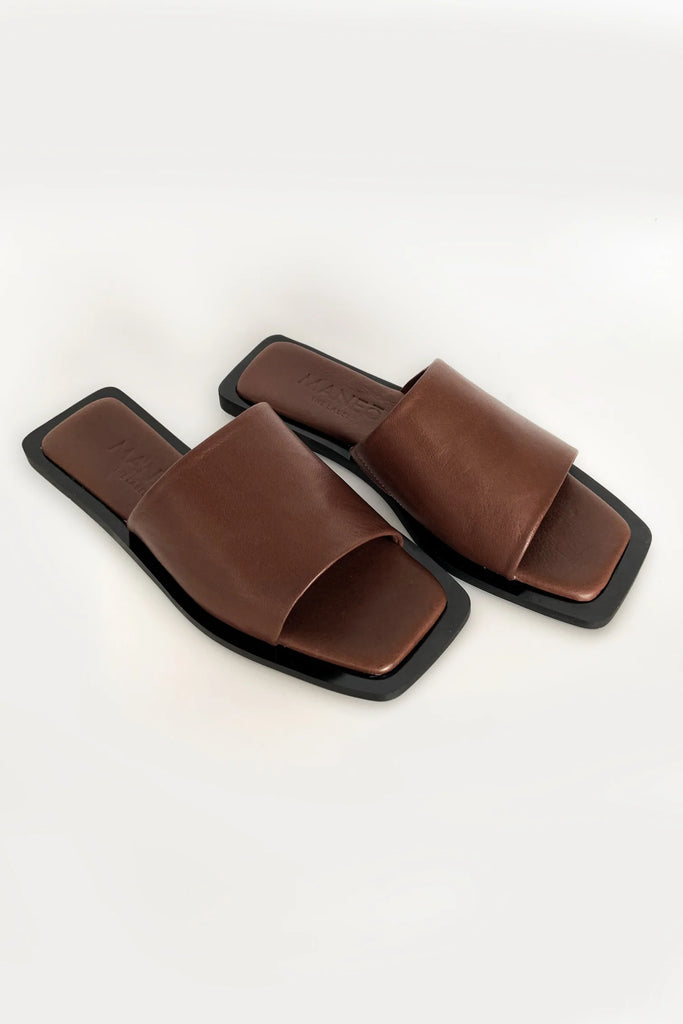 Lenny Sandals displayed in both suede and leather options, showcasing their luxurious materials and classic design.