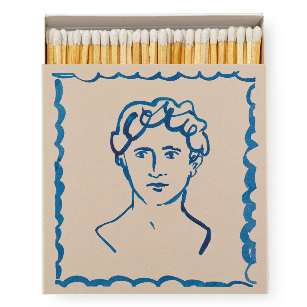 A square matchbox adorned with a handsome statue pattern "Handsome Matches.