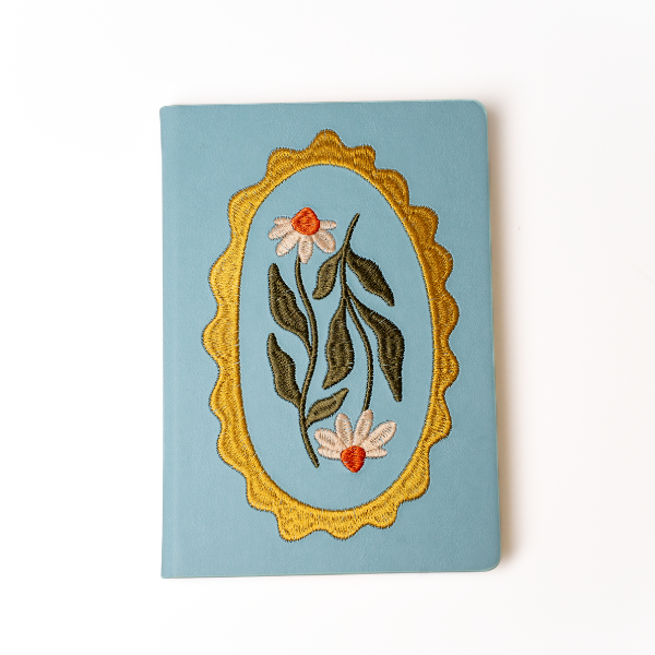 Daisy Frame hardbound notebook by Denik, daisy embroidery on a soft-touch vegan leather cover