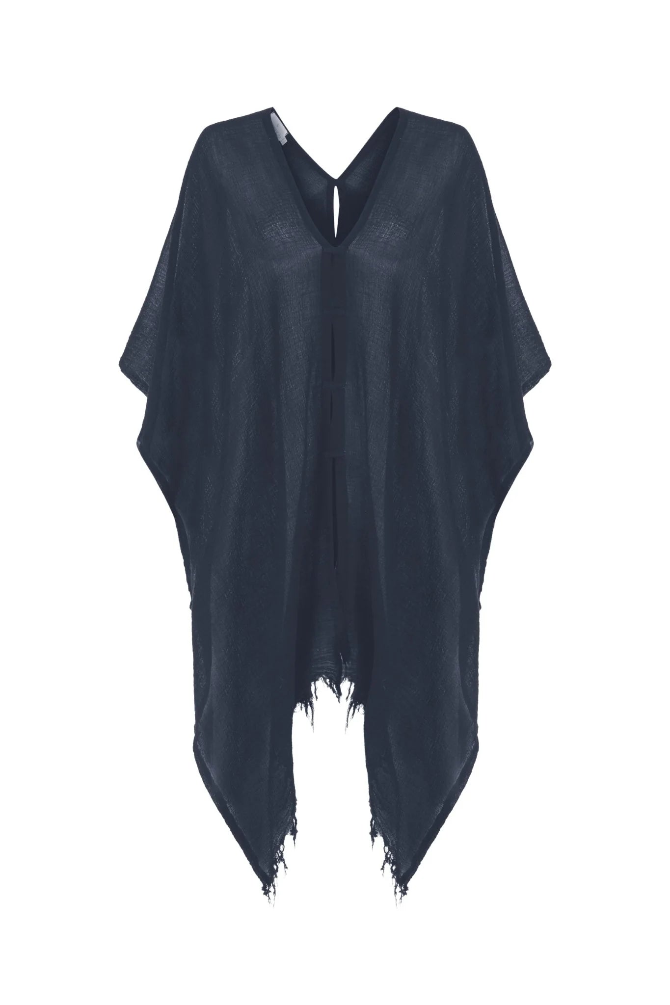 A woman gracefully wearing the Ava Kimono, showcasing its flowing silhouette, delicate patterns, and high-quality fabric.