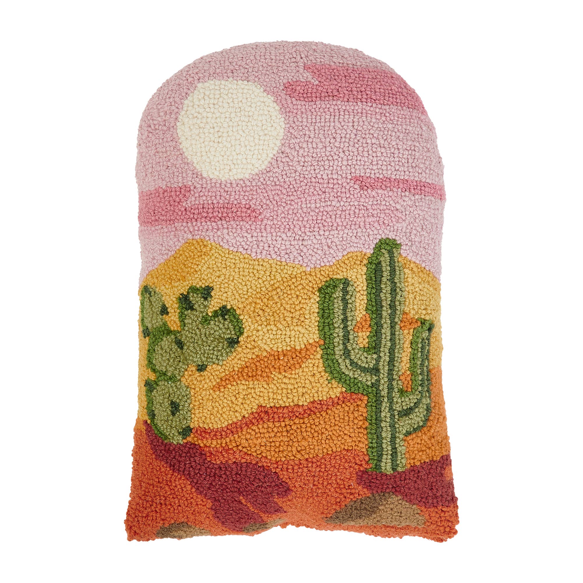 Colorful hooked pillow shaped with a desert scene, featuring cacti, sun, and sunset tones in pink, orange, and yellow.