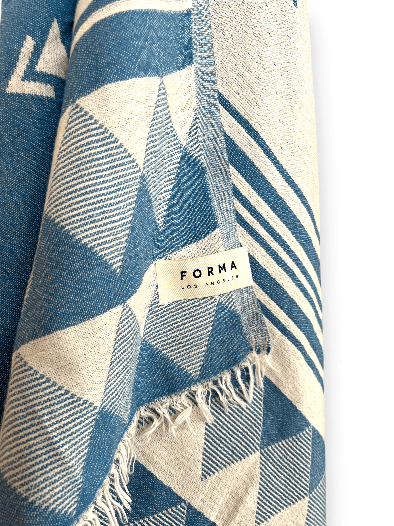 A set of Forma Towels from the Yosemite Collection, showing their soft, absorbent texture, suitable for beach or home use.