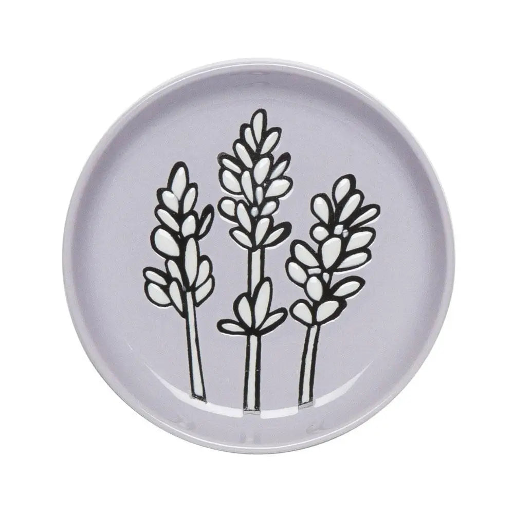 A Lavender Coaster resting on a table, adorned with a vibrant lavender pattern.