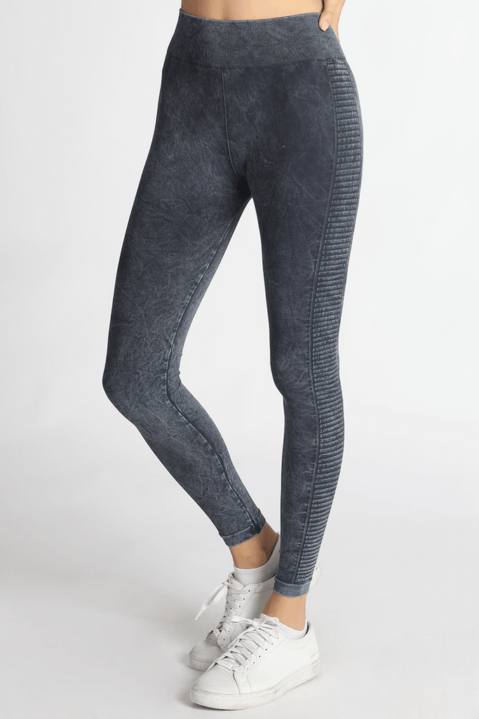 Fashion-forward woman showcasing the flattering fit and versatile style of FORMA's Ryder Jeggings.