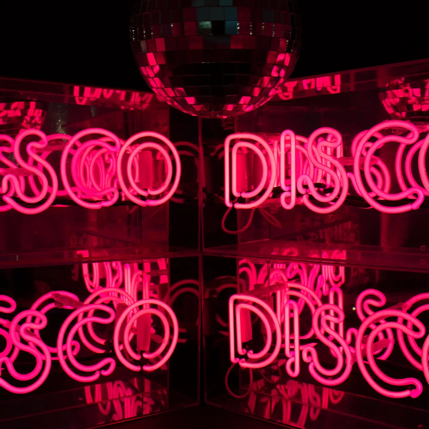 FORMA's Neon Pink Disco Light, a vibrant sign bringing the energetic glow of the dancefloor to your space.