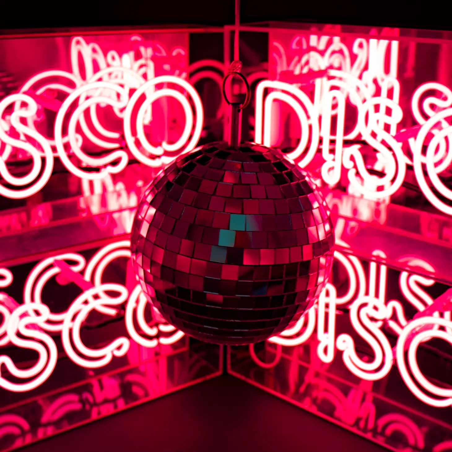 FORMA's Neon Pink Disco Light, a vibrant sign bringing the energetic glow of the dancefloor to your space.