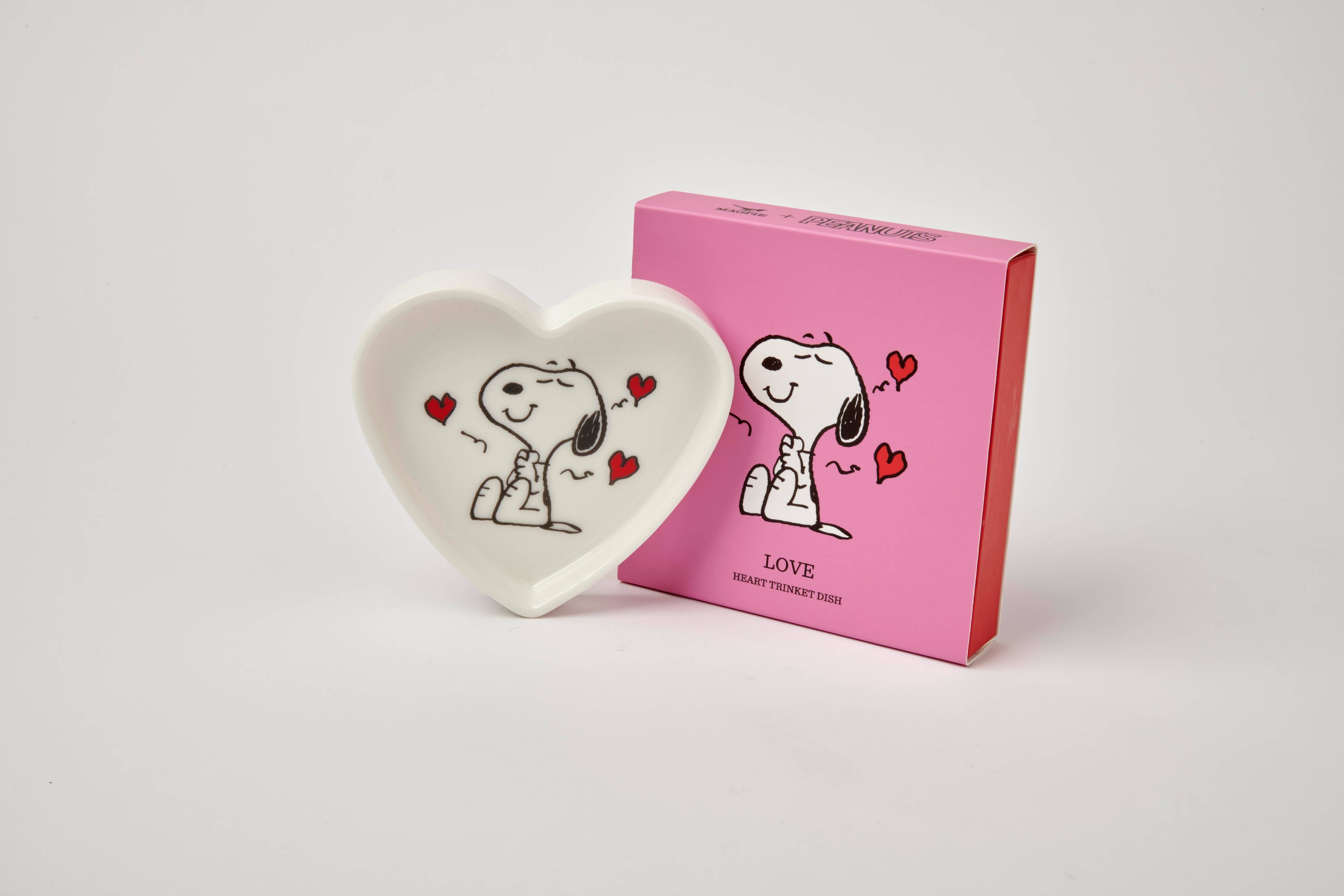 Heart-shaped ceramic trinket dish with a black-and-white illustration of a smiling beagle, accented by red hearts, alongside a matching pink gift box.