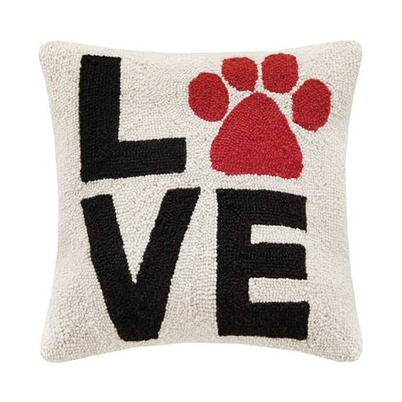 Square hook pillow with the word "LOVE" and a red paw print in place of the letter “O.”