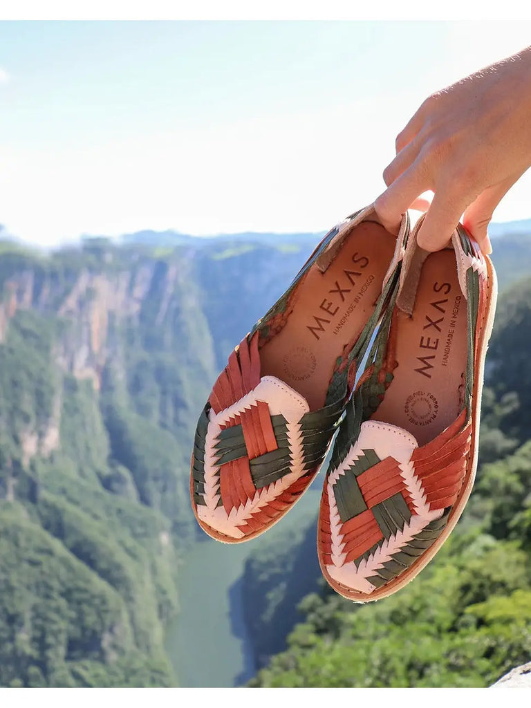 Handmade Chiapas sandals crafted from 100% genuine leather, showcased on an artisanal backdrop.